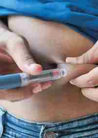 Yong Person Injecting Insulin
