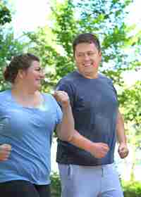 Young Couple Exercising Outside