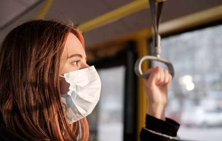 Commuter Wearing A Protective Mask In Public Transport