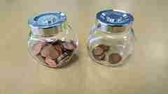 pennies split between two jars