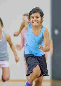 Children Running In Gym Class